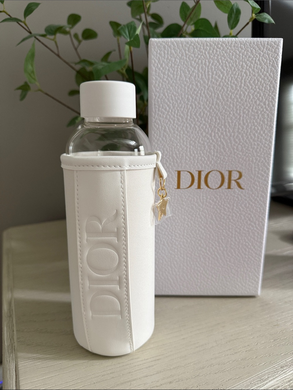 Dior White & Gold Embossed Bottle with Charm